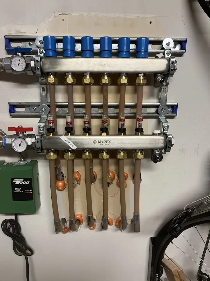 Plumber performing Gas Line Installation at a residential property in Springfield